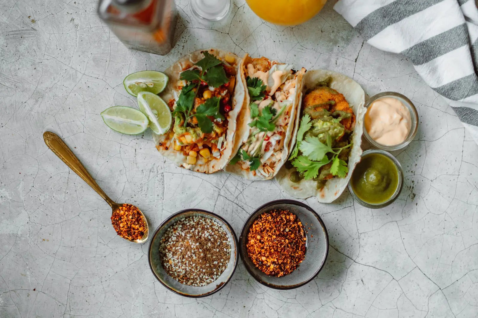 Homemade taco seasoning ingredients in small bowls